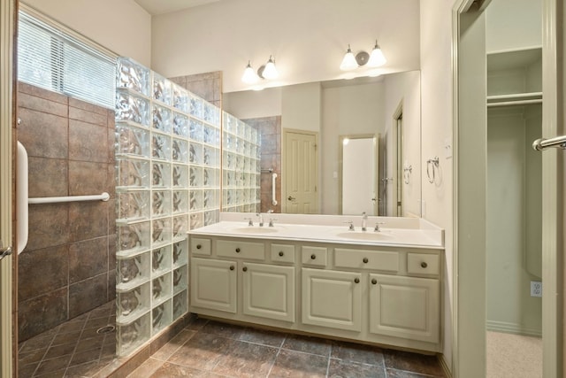 bathroom featuring vanity and walk in shower