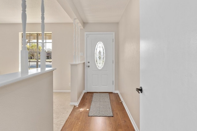 entrance foyer with hardwood / wood-style floors