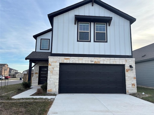 view of front of property featuring a garage