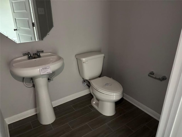 bathroom featuring toilet