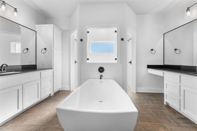 bathroom featuring a bathtub and vanity