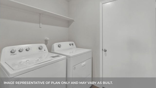 laundry room with washer and dryer