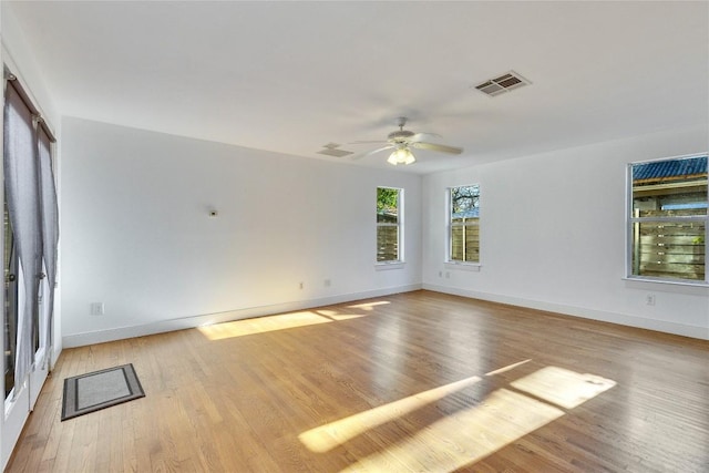 1721 Palma Plz, Austin, TX 78703 - unfurnished room with a ceiling fan and wood finished floors