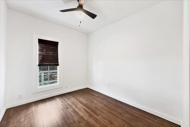 spare room with hardwood / wood-style flooring and ceiling fan