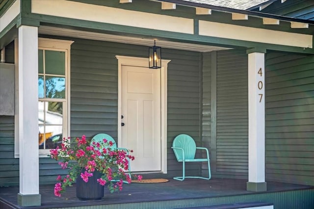 entrance to property with covered porch