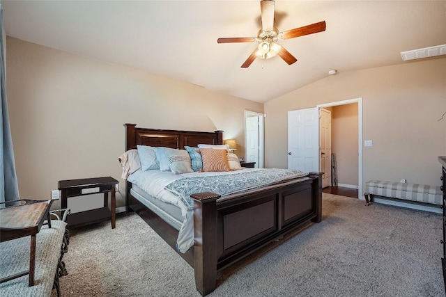 bedroom with carpet floors, ceiling fan, and lofted ceiling