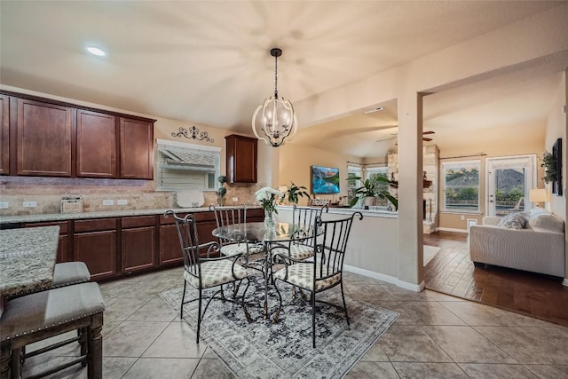 dining room featuring a chandelier and light hardwood / wood-style floors