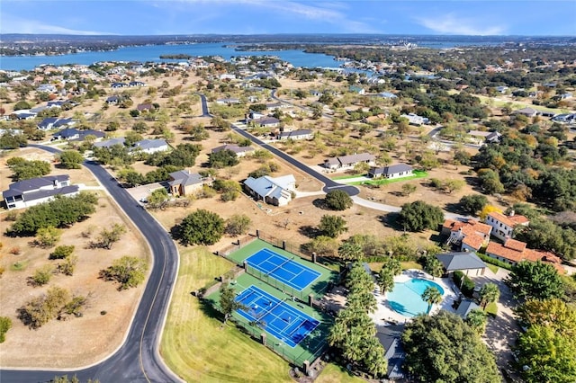 birds eye view of property featuring a water view