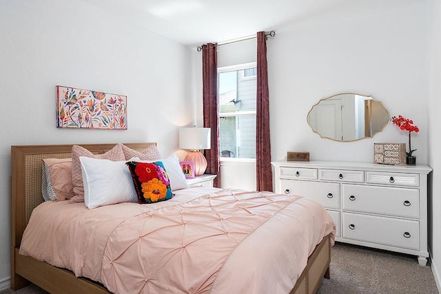 bedroom featuring light colored carpet