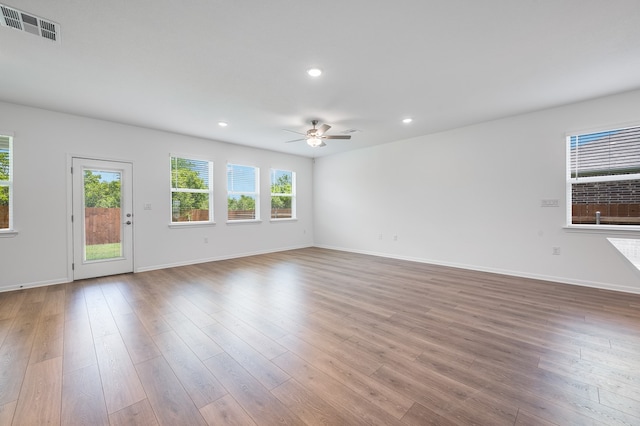 1804 Lorant Ln, Pflugerville, TX 78660 - unfurnished room featuring a ceiling fan, wood finished floors, recessed lighting, and baseboards