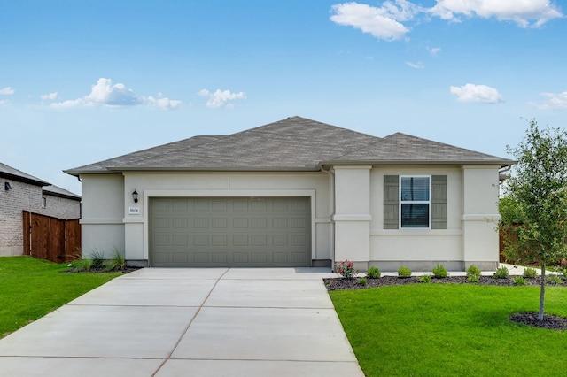 1804 Lorant Ln, Pflugerville, TX 78660 - view of front facade with a garage, concrete driveway, stucco siding, and roof with shingles