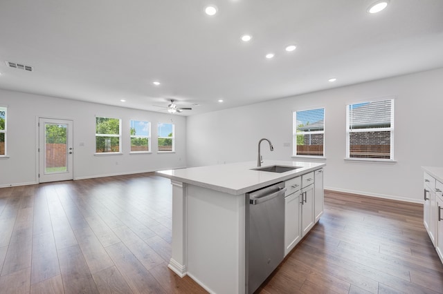 1804 Lorant Ln, Pflugerville, TX 78660 - kitchen featuring stainless steel dishwasher, a sink, plenty of natural light, light countertops, and recessed lighting