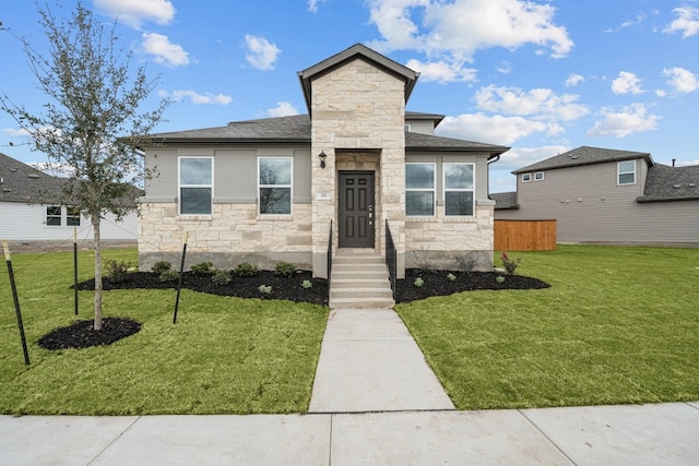 view of front facade featuring a front yard