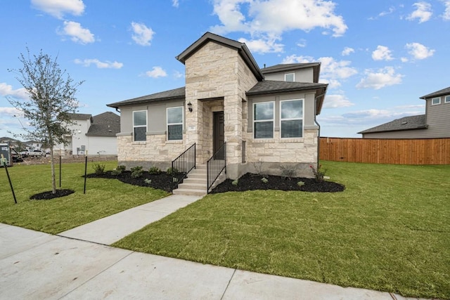 view of front of home with a front lawn