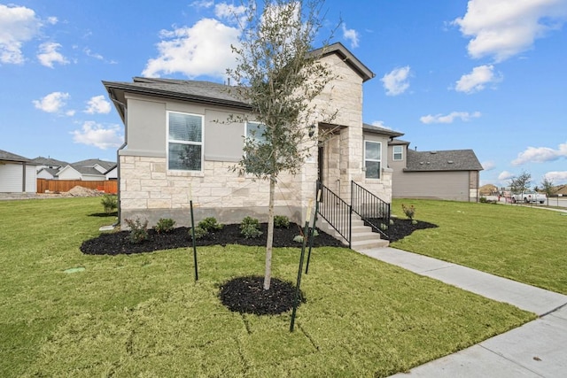 view of front facade featuring a front lawn