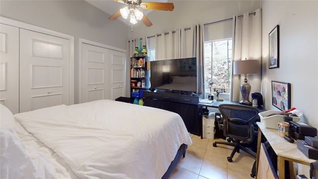 7 Hull Circle Dr, Austin, TX 78746 - bedroom featuring light tile patterned floors, an office area, and a ceiling fan