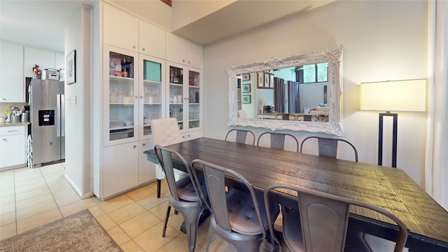 dining room with light tile patterned floors