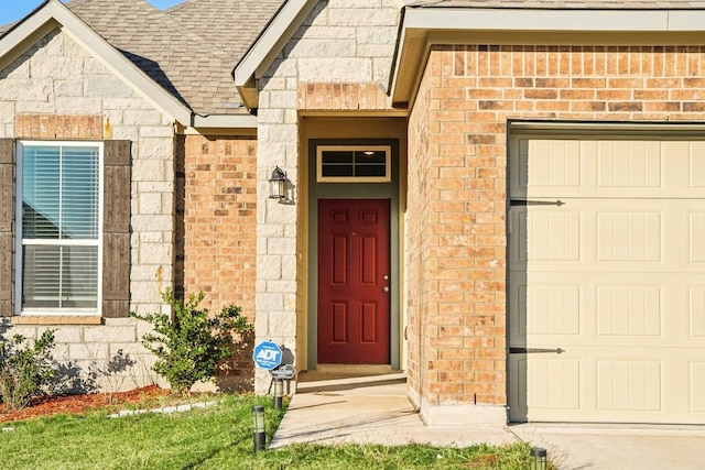 property entrance featuring a garage