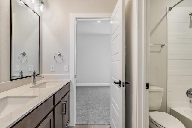 full bathroom with vanity, toilet, and bathing tub / shower combination