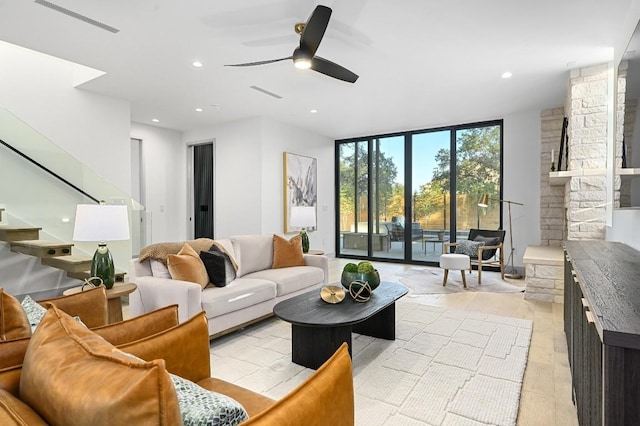 2423 S 5th St, Austin, TX 78704 - living area with stairs, ceiling fan, recessed lighting, and floor to ceiling windows