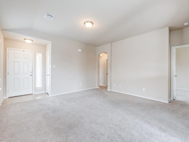 view of carpeted spare room