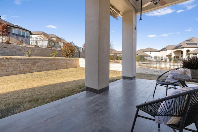 view of patio / terrace featuring ceiling fan