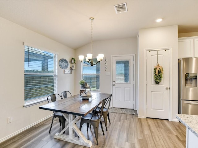 1640 T H Johnson Dr, Taylor, TX 76574 - dining room with a chandelier, light wood-type flooring, and recessed lighting