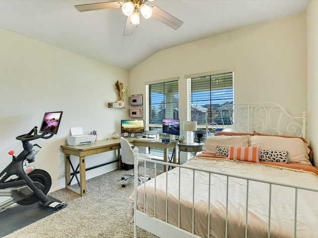 carpeted bedroom with ceiling fan and lofted ceiling