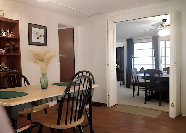 dining room featuring hardwood / wood-style floors and ceiling fan