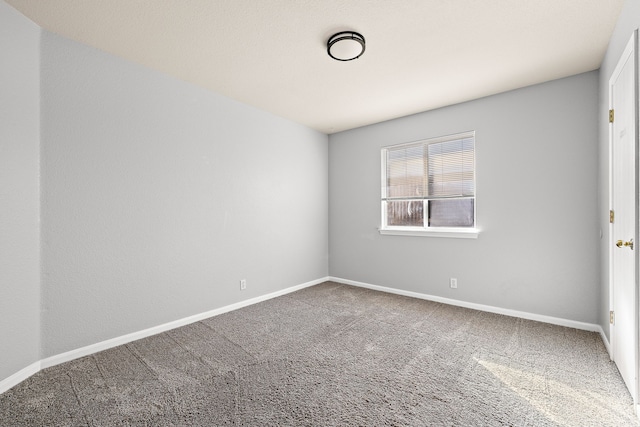 unfurnished room with carpet