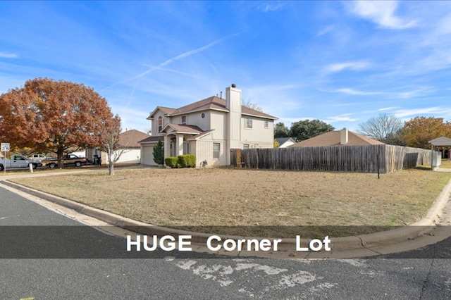 view of side of property with a garage