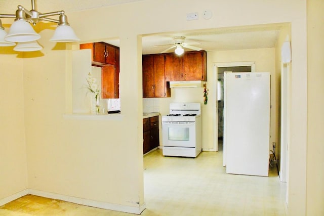 kitchen with ceiling fan and white appliances