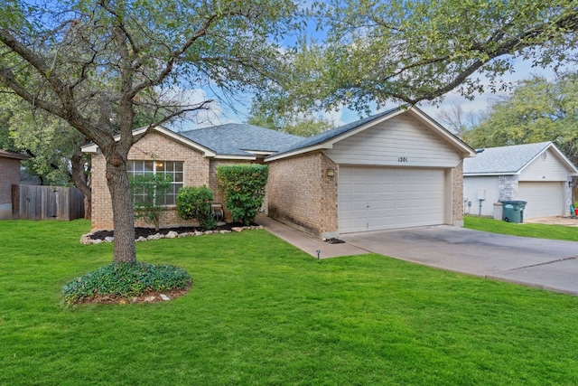 ranch-style home featuring a garage and a front lawn