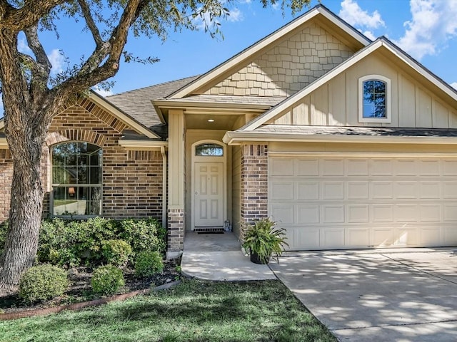 view of front of property with a garage