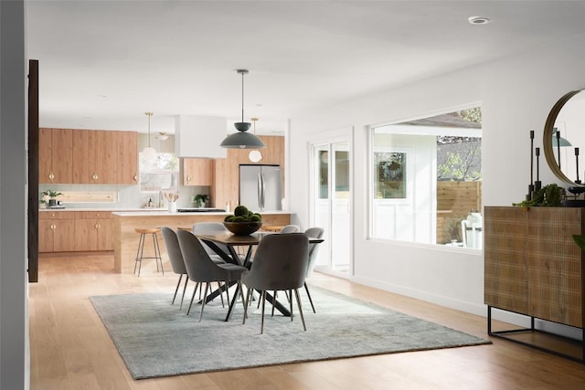 dining room featuring light hardwood / wood-style floors