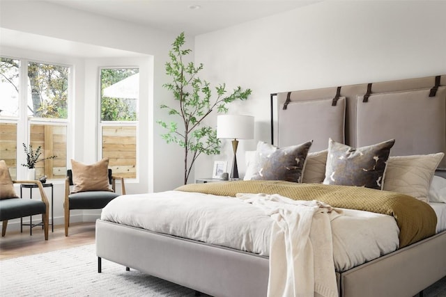 bedroom with wood finished floors