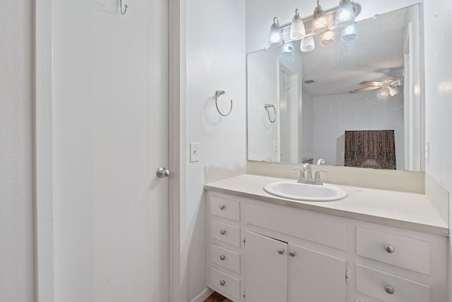 bathroom featuring vanity and ceiling fan