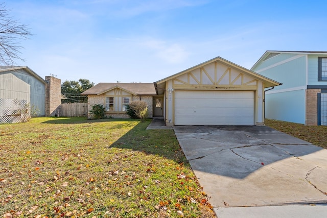 single story home featuring a front yard and a garage