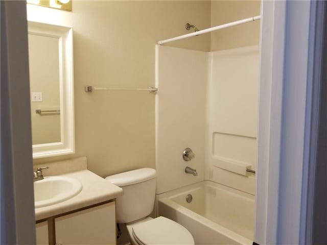 full bathroom with vanity, toilet, and shower / washtub combination