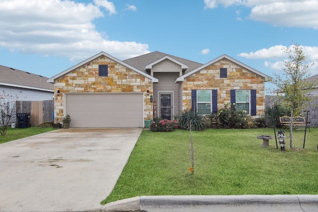 view of front of house with a front yard and a garage