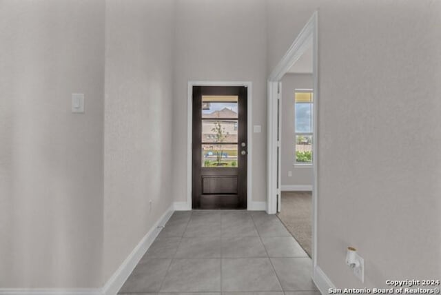 209 Filmore Fls, Cibolo, TX 78108 - entrance foyer featuring light tile patterned flooring and baseboards