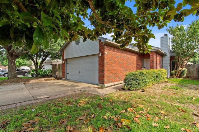 view of side of home featuring a yard