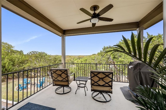 balcony with ceiling fan and a grill