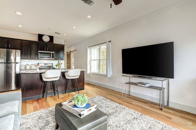 living room featuring light hardwood / wood-style floors