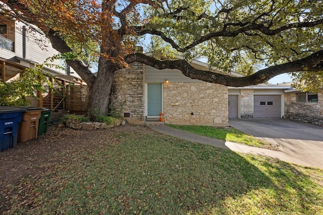 single story home featuring a garage