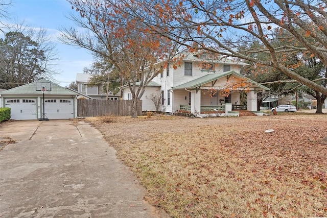 view of front facade with a porch and a garage