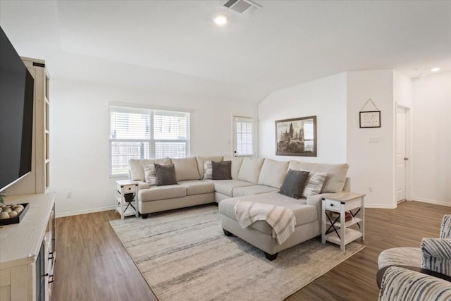 living room with light hardwood / wood-style floors