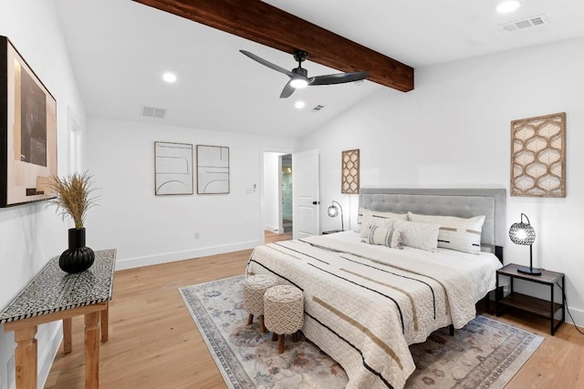 bedroom with vaulted ceiling with beams, ceiling fan, and light hardwood / wood-style flooring