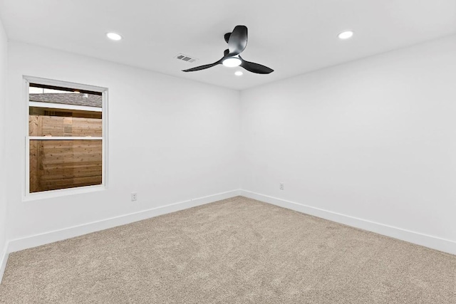 unfurnished room featuring carpet flooring and ceiling fan