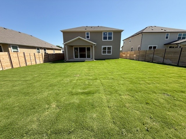 128 Alistair Dr, Georgetown, TX 78633 - back of property with stucco siding